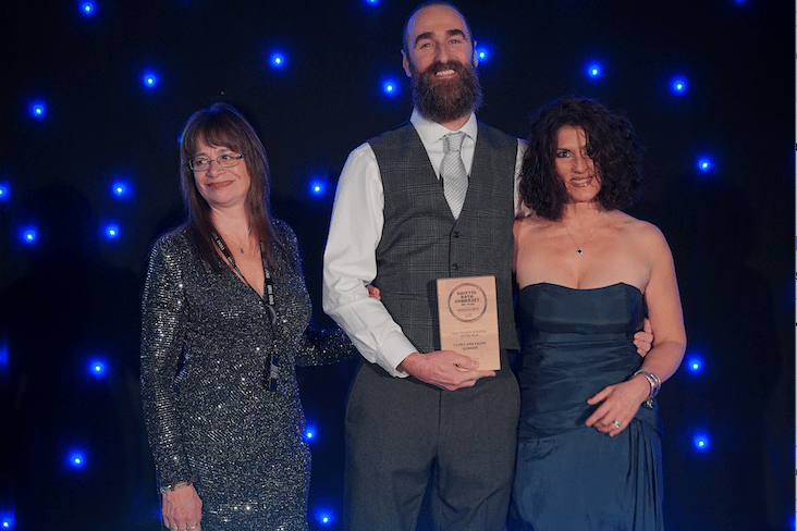 Rachel (right) and Dan Barber, collect one of their three gold awards for Flora and Fauna, Skilgate, at this year's regional tourism presentation night.