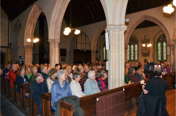 A Sky Television cameraman films in All Saints Church during this year's Dulverton Exmoor Literary Festival.