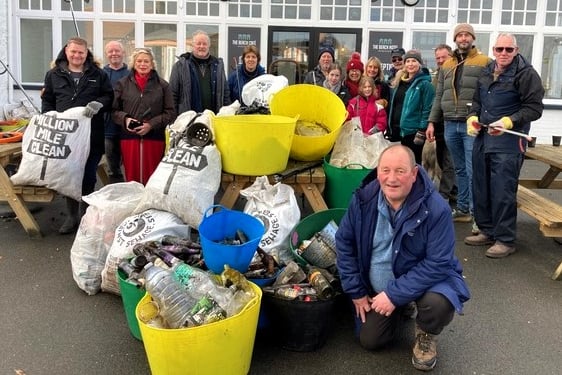 Some of the Plastic Free Minehead clean-up volunteers with rubbish they collected around the town.