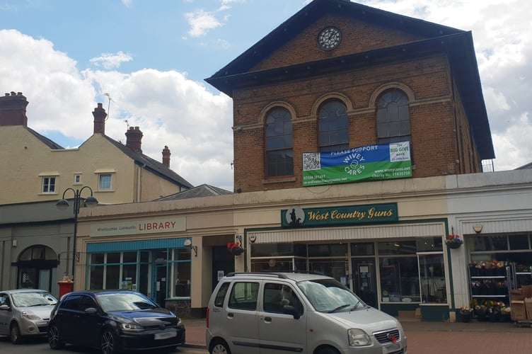 Wiveliscombe Town Hall sits above the community library which trustees have agreed to manage.