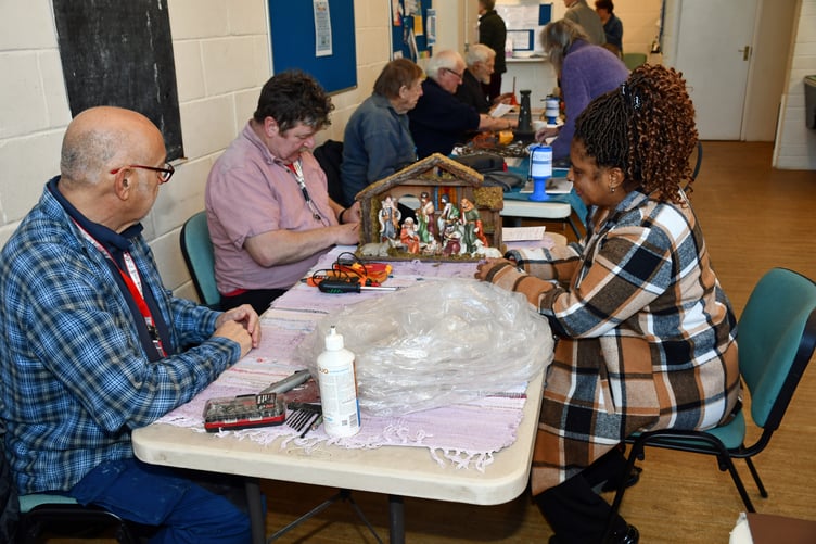 Volunteers in Watchet Repair Café appropriately enough carried out repairs to a Nativity figure.