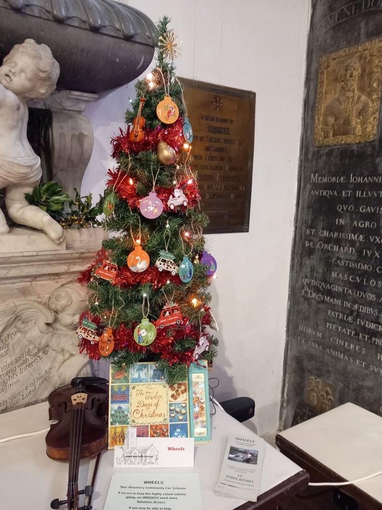 Community car scheme WHEELS took part in this year's Christmas tree festival in St Decuman's Church, Watchet.