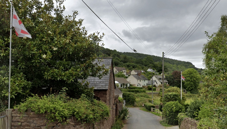 Flags can be seen flying from properties in Wootton Courtenay, on Exmoor.