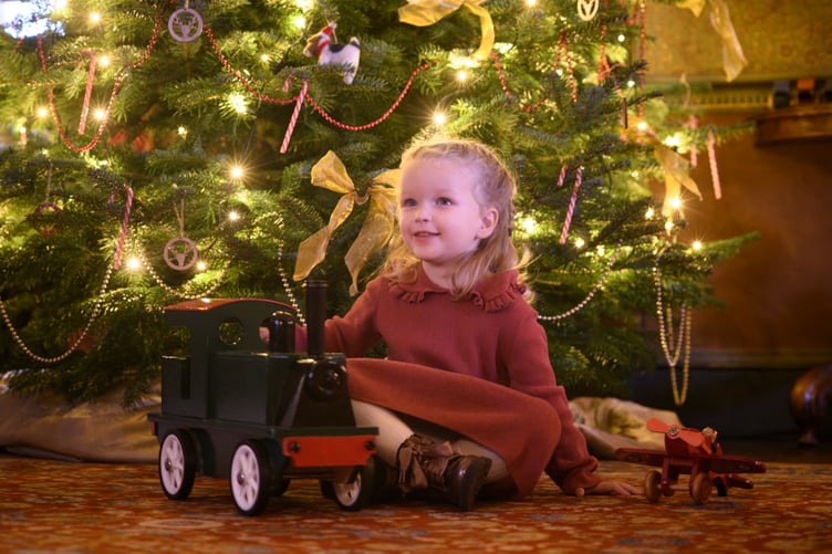 Step into a Traditional Country Christmas at Dunster Castle and Watermill
Dunster Castle and Watermill, Somerset, invites visitors to experience the magic of a country Christmas, inspired by the traditions of the Luttrell family, on selected days from Saturday 29 November to Sunday 4 January.
This festive season, the National Trust's Dunster Castle will be transformed with towering Christmas trees, natural garlands, and seasonal decorations throughout the historic rooms. On weekends leading up to Christmas, visitors can enjoy live music performances, and from 13 to 21 December, the castle will open after dark for a special illuminated experience. - House Staff & Volunteers pictured