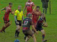 Wiveliscombe march on at the top of the table 