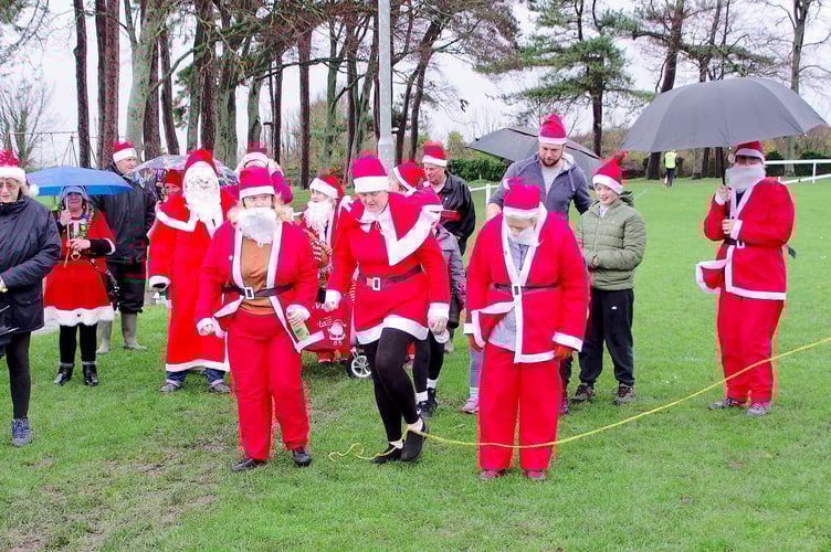 Blustery weather did not deter these Santas taking part in Watchet's first fun run in the war memorial recreation ground.