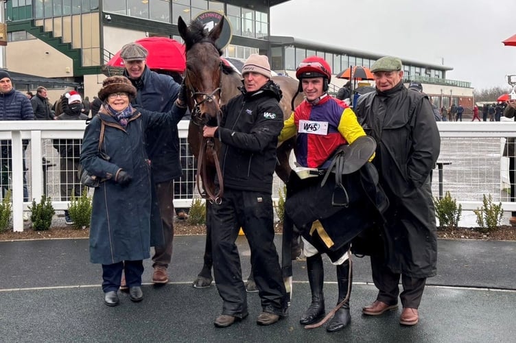 Gentleman Toboot in the winners enclosure with jockey Jack Tudor, David Pipe, Gerry Supple and winning connections