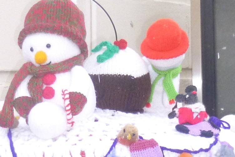 'A Christmas Box for Minehead' - this knitted topper adorns the post box in Bancks Street, Minehead. PHOTO: David Edwards