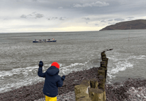 Santa arrives by sea with touch of magic for Porlock Weir inaugural festive afternoon