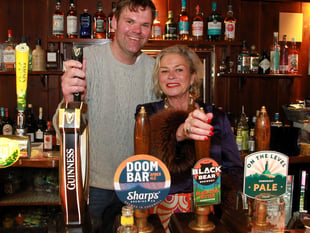 Pub's community efforts praised in Parliament