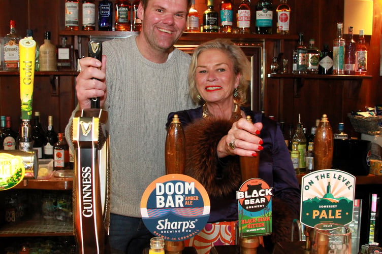 Butchers Arms landlord Nick Moores with local MP Rachel Gilmour on opening night.