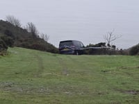 Drama as campervan becomes stuck near clifftop