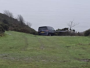 Drama as campervan becomes stuck near clifftop