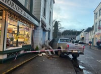 Car crashes into front of town centre house