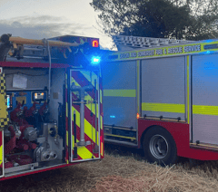 One trapped as two cars collide