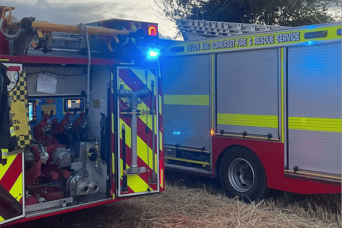 Firefighters freed a person trapped in a vehicle after a two-car crash near Hinkley Point.