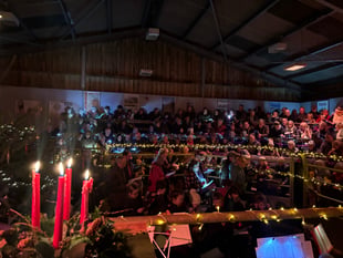 Farming families sing in auction ring