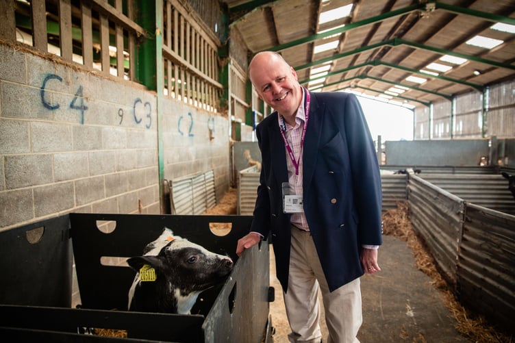 MP Sir Ashley Fox visits a farm in West Somerset.