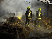 Farmer helps firefighters tackle blazing barn