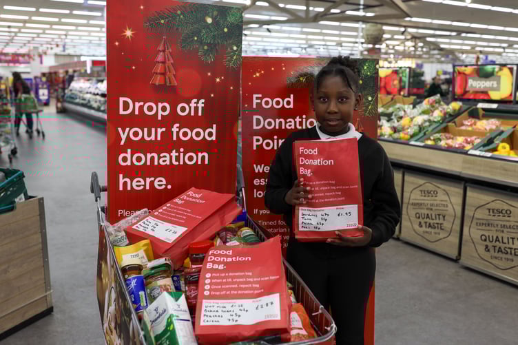 Tesco customers have given food to charities to provide nearly 17,000 meals this Christmas season,
