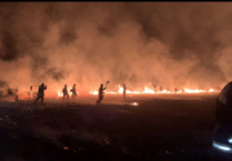 Moorland arsonist returns as fire crews spend most of Christmas Day battling flames