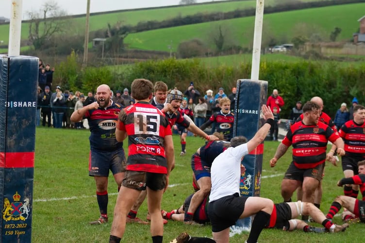 Wiveliscombe prop Matt Ellis celebrates a try for the home side.