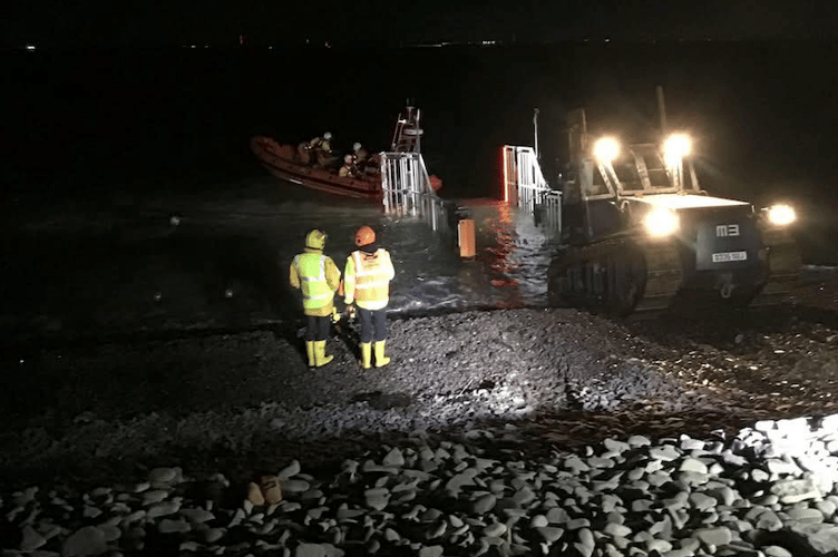 Minehead lifeboats launch in darkness after two people became trapped by the ride near Kilve.