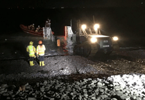 Lifeboat crews brave 'tricky' seas for twilight rescue of pair trapped near Kilve
