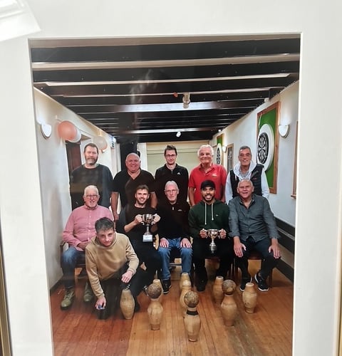 The late Tony Clausen is pictured second from the right in the back row next to his son