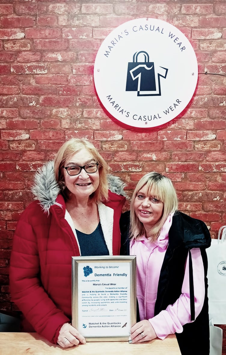 Maria Morgan (right) receives her dementia-friendly certificate from Watchet and the Quantocks Dementia Action Alliance's Margaret Tatham.