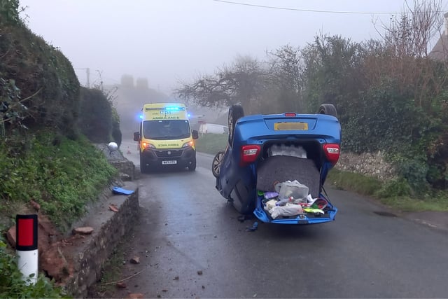 Crash car flips on to its roof