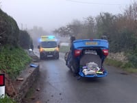 Crash car flips on to its roof