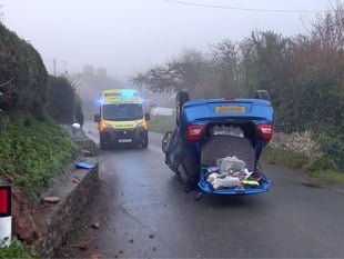 Crash car flips on to its roof