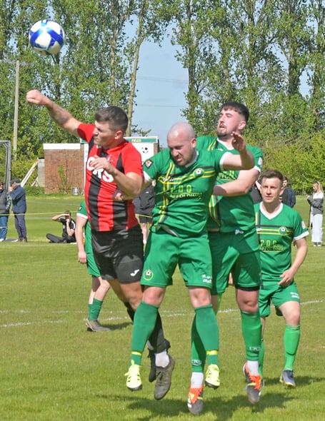 Charley Clausen - (red and black) has played in goal for Watchet in the past
