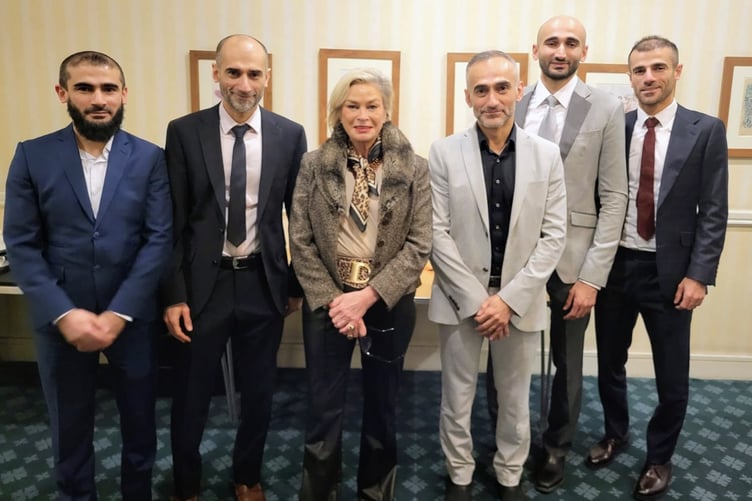 MP Rachel Gilmour with Allied Pharmacies brothers (left to right) Mussab Sharief, Suhail Sharief, Suhaib Abdullah, Bilal Sharief, and Abdul Sharief.