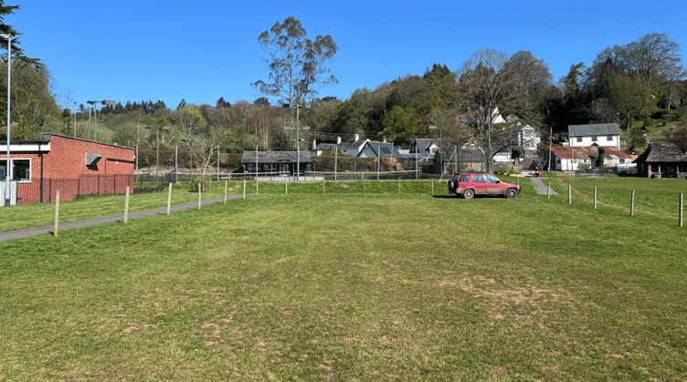 The grassed area Wiveliscombe Recreation Ground Committee wants to turn into a permanent car park.