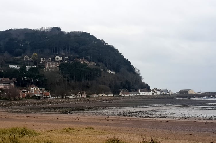 Minehead beach with North Hill and harbour in the background