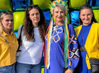 Ukrainians protest loss of welcome hub manager