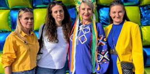 Ukrainians protest loss of welcome hub manager