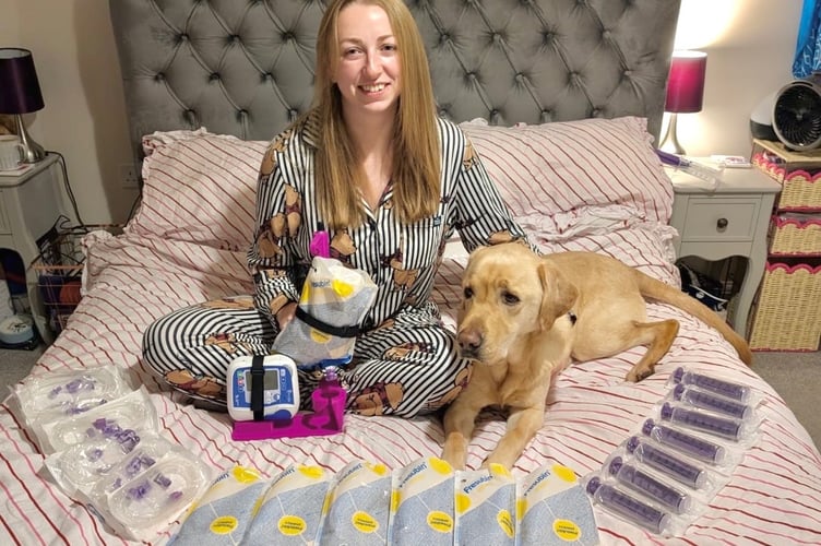 Wiveliscombe firefighters are fund-raising to help fireman's wife Sophie Tiley meet the cost of an operation to mitigate the effects of two rare conditions from which she suffers.