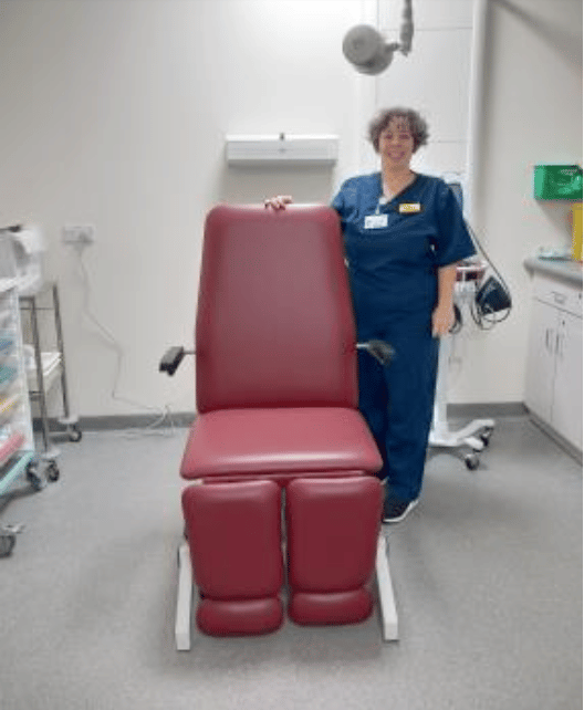 Rachel Stoneham with Minehead Hospital's new plaster chair funded by the league of friends.