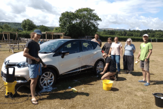 A car wash in Allerford helped raise funds for a slide for the village playing field.