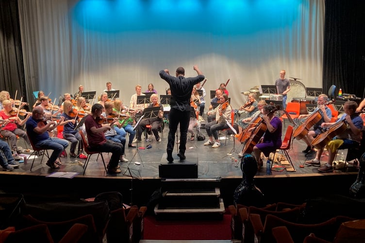 Some of the Minehead and Exmoor Musical Festival orchestra in rehearsal.