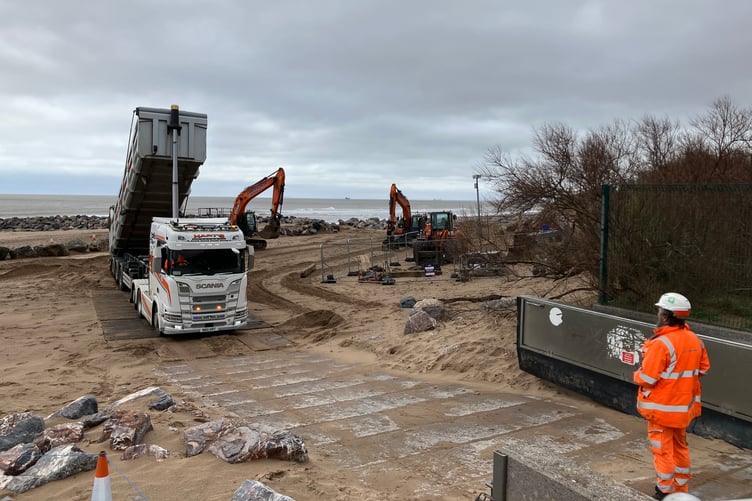 Rock armour being put in place in 2023 to help protect Minehead from flooding by the sea.