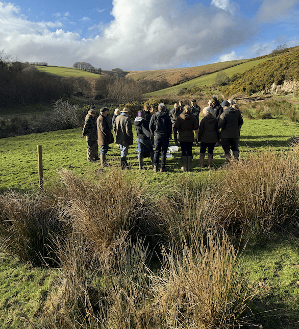 Nearly 30 Exmoor farmers attended a dung beetle workshop to learn how the insects can boost farm productivity.