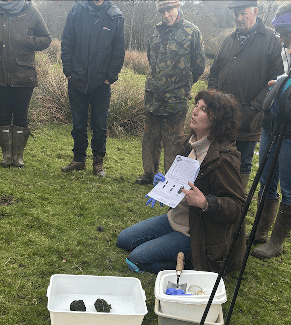 National dung beetle expert Sally-Ann Spence explains to Exmoor farmers the importance to them of the insect.