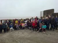 Volunteers spring clean town beach