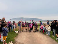 Mums' walk raises £12k for schools