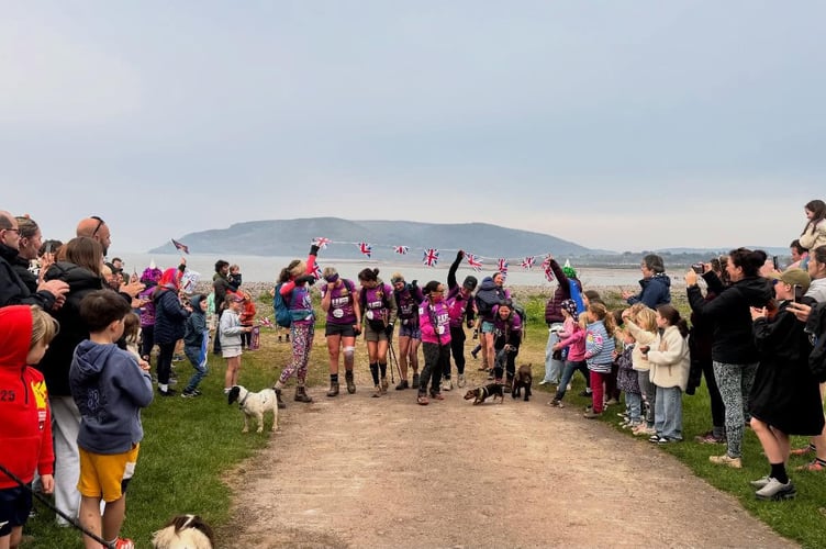 The Moorland Mums reach the finishing line at Porlock Weir. PHOTO: Exmoor Magazine.