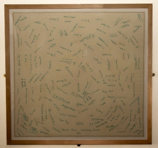 Crowcombe's ‘Electricity Fund Signature Cloth’ is now back on display in the village's historic Church House.